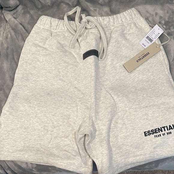 NWT, brand new Fear of God Essentials light oatmeal xs shorts - Picture 1 of 3